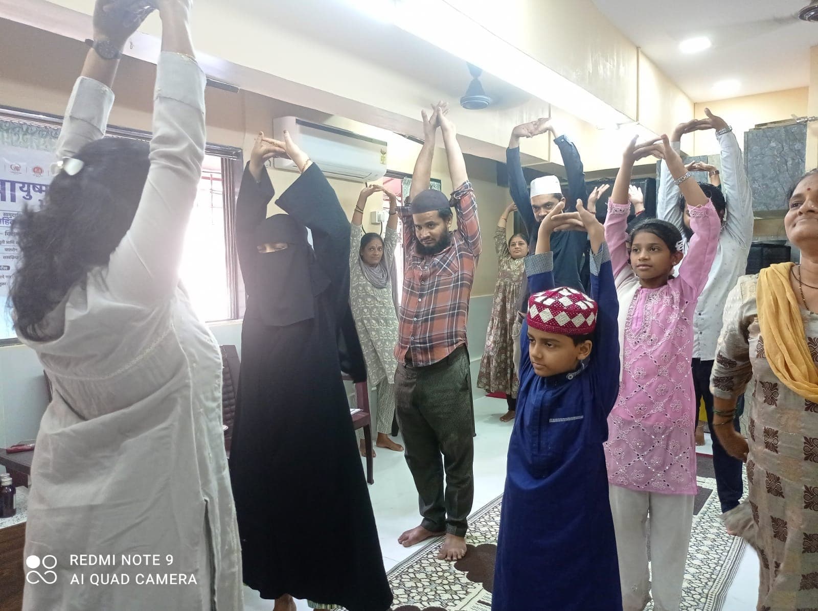 Volunteer helping in spreading yoga awareness